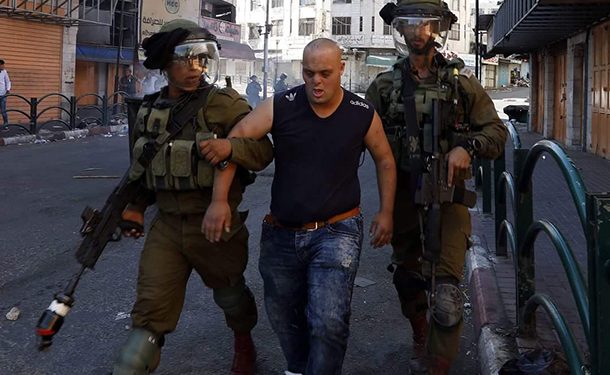 israil askerleri filistinli down sendromlu genc gozalti 1